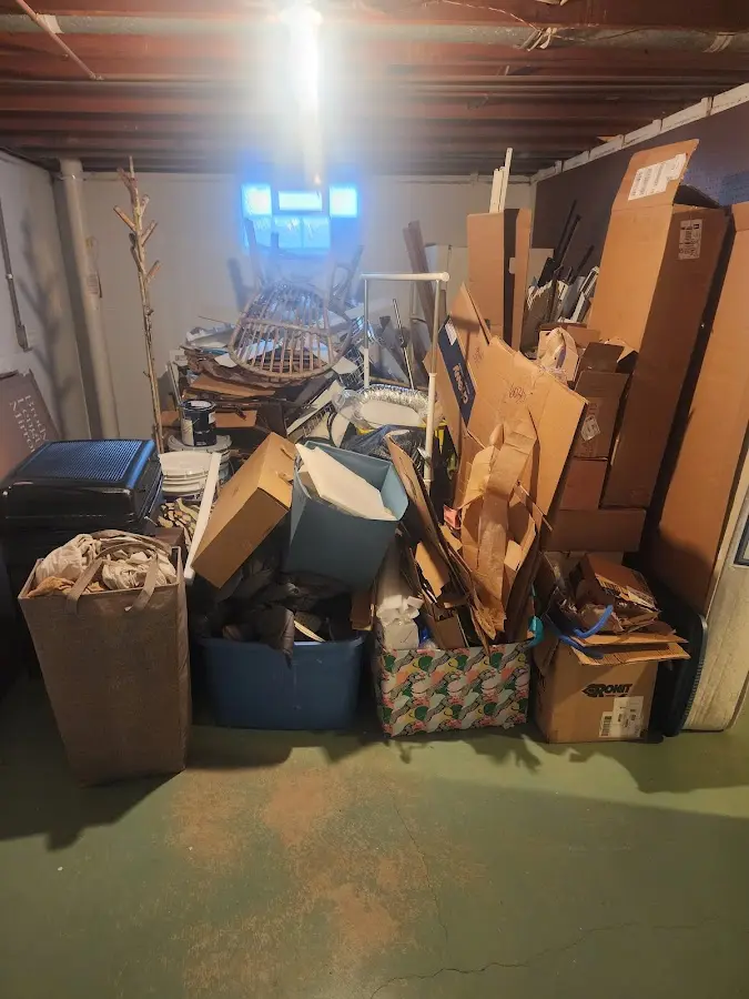 Roll-off dumpster container at job site for 2 Yard Dumpster Rental in Rainbow Springs